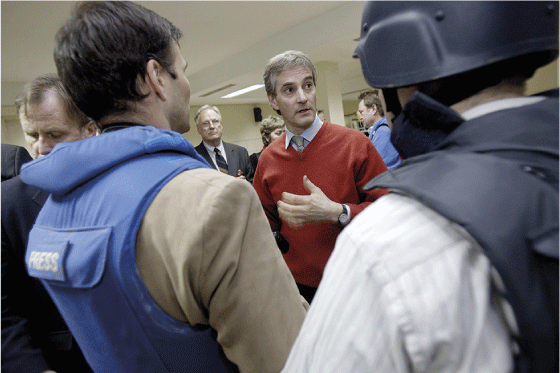 Figure 12.5 Minister of Foreign Affairs Jonas Gahr Støre speaking with the media in the hotel bomb shelter after the terror attack on the Serena Hotel in Kabul on 14 January 2008. 

