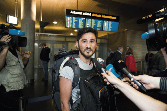 Figure 12.6 Faizullah Muradi, an Afghan combat interpreter for Norway, arriving at Oslo Gardermoen airport from Rome on 5 June 2014. He was met by the media and a number of Norwegian veterans of Afghanistan. 
