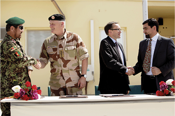 Figure 3.7 On 11 September 2012 Brigadier General Noor Mohammad Hamid, Chief of Defence Harald Sunde, Minister of Foreign Affairs Espen Barth Eide and Governor Ahmed Faizal Begzaad signed an agreement for the Afghan takeover of the Norwegian-led PRT camp in Mey...