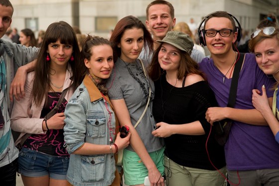 Group of Polish youth arm in arm.