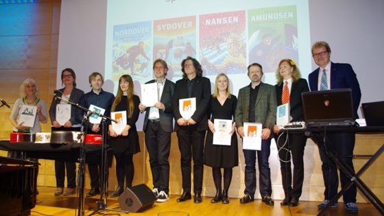 Gruppebilde av prisvinnerne sammen med statssekretær Bjørgulv Vinje Borgundvaag.