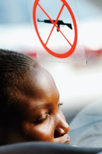 Figure 3.4 The ICRC’s “No weapons” symbol is important to the protection of civilians and the humanitarian space. The photo is from a bus in DR Congo.