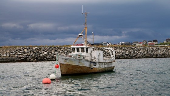 A fishing boat at harbour in Mehamn municipality in Norway.