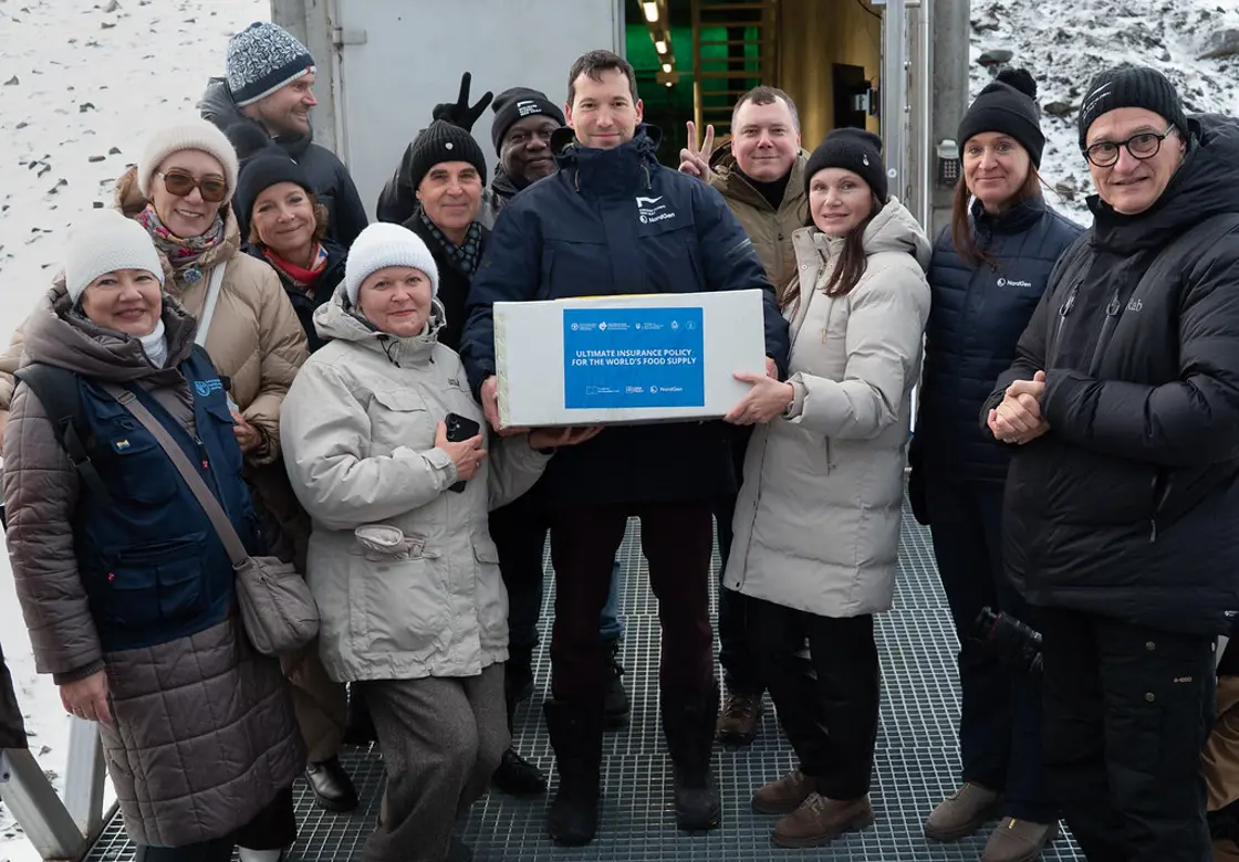 Ukraine deposited 773 seed samples during the deposit in October 2026. In the center of the image is Seed Vault Coordinator Fuad Gasi from NordGen, flanked by representatives from Ukraine’s National Center for Plant Genetic Resources.
