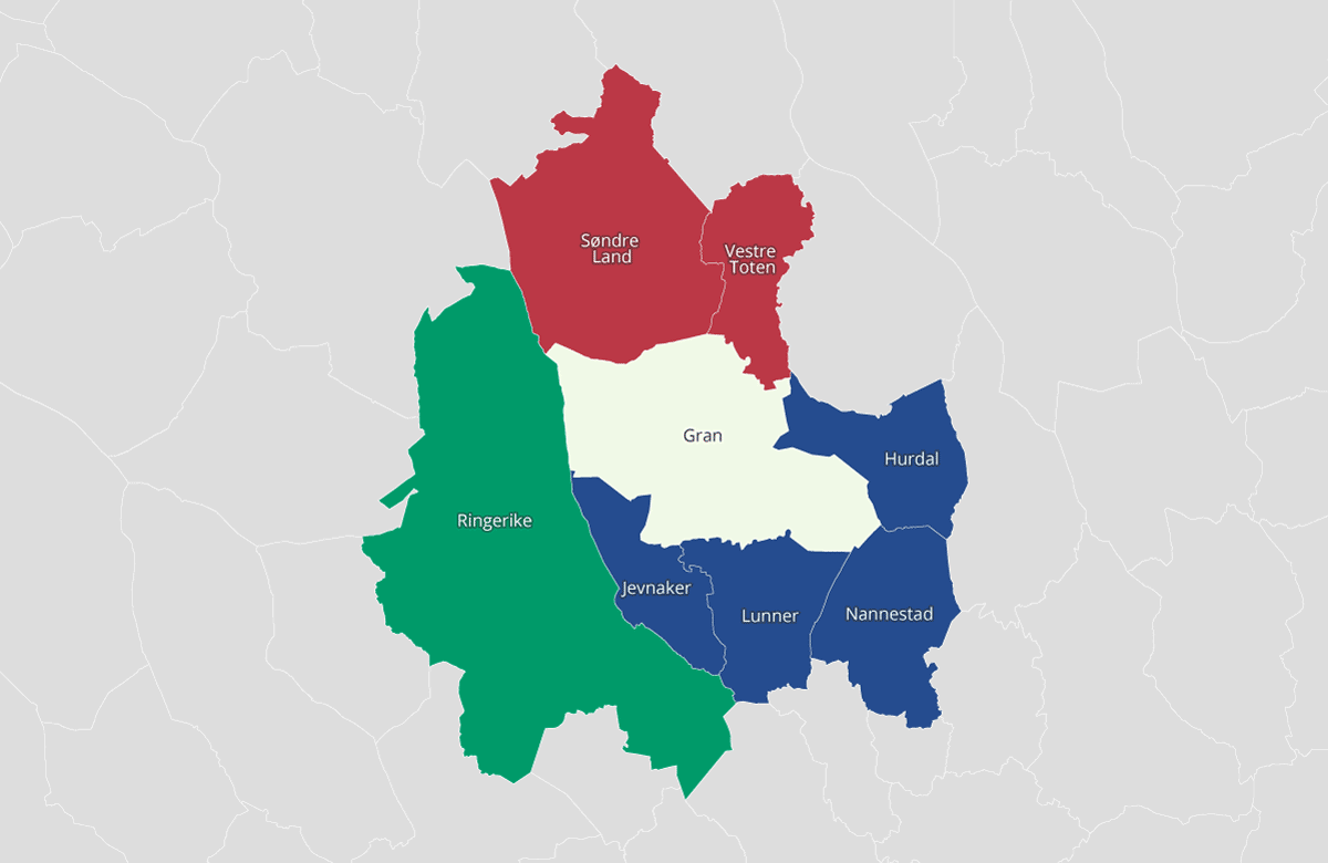 Figur 2.1 Kart over Gran kommune og nabokommunene i Akershus (blå), Innlandet (rød) og Buskerud (grønn)