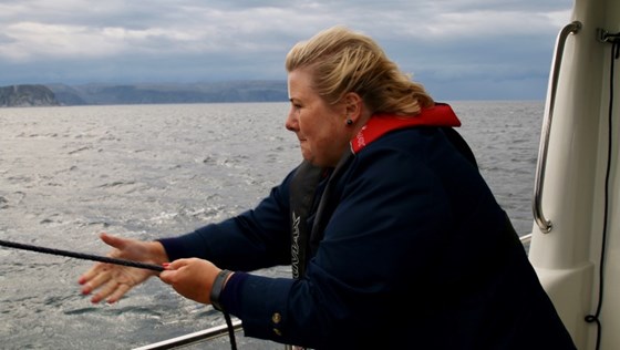 Prime Minister Erna Solberg fishing outside Mehamn.