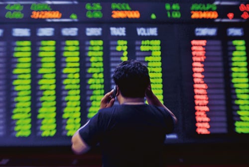 Figure 6.2 The financial crisis is affecting people all over the world.
 The Karachi Stock Exchange is no exception.