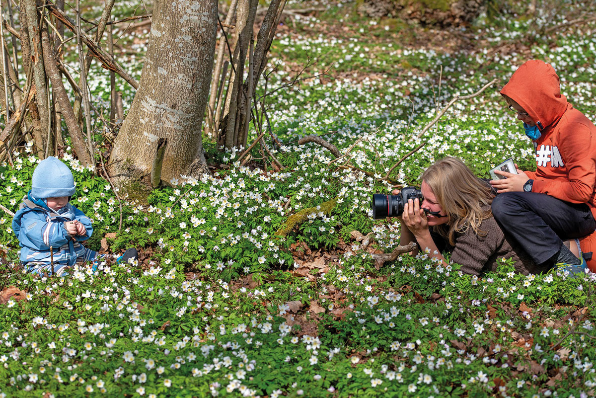 Voksne tar bilde av et barn med hvitveis