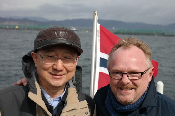 Fiskeriminister Per Sandberg og ministeren for Kinas veterinærmyndigheter, Shuping Zhi. Foto: NFD