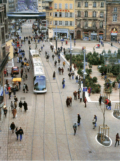 Figure 2.2 The City railroad in Strasbourg, France. The city railroad is lead through central squares and the pedestrian zone, having a trace of its own. Avenues, streets and buildings along the track were improved simultaneously during the construction period ...