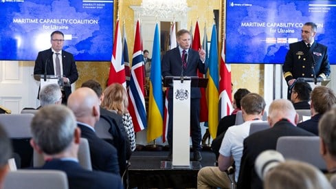 Image of the Secretary of State for Defence Grant Shapps (centre), seen here with the Norwegian Defence minister, Bjørn Arild Gram (left) and Commander of the Ukrainian Navy Olekesiy Neizhpapa (right) at a trilateral agreement between the UK, Norway, and Ukraine.