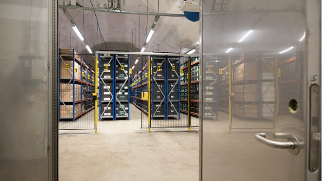 Seed boxes from many gene banks and many countries stored side by side on the shelves in the Seed Vault.