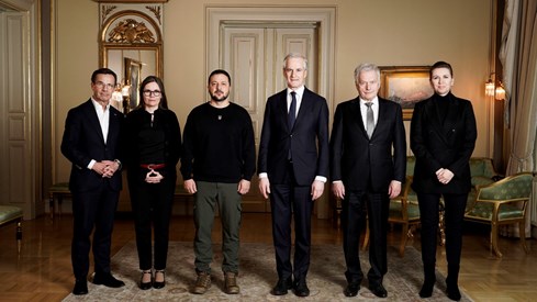 Ukrainian president and Nordic leaders in a group photo.
