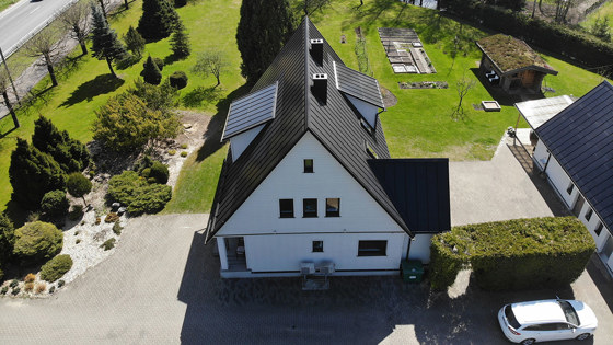 Houses with integrated solar panels.