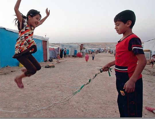 Syriske flyktningbarn i Domiz flyktningleir i nord-Irak. Haider Ala / Reuters / NTB Scanpix
