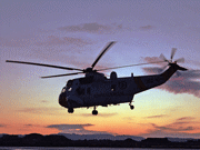 A Sea King-helicopter at sunrise. Photo: Arne Flaaten, Forsvarets mediesenter