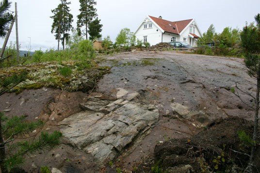 Formålet med naturreservatet er å sikre en spesiell geologisk forekomst av bergarten Moelvtillitt som har særskilt naturvitenskaplig verdi. Foto: Johan Petter Nystuen.